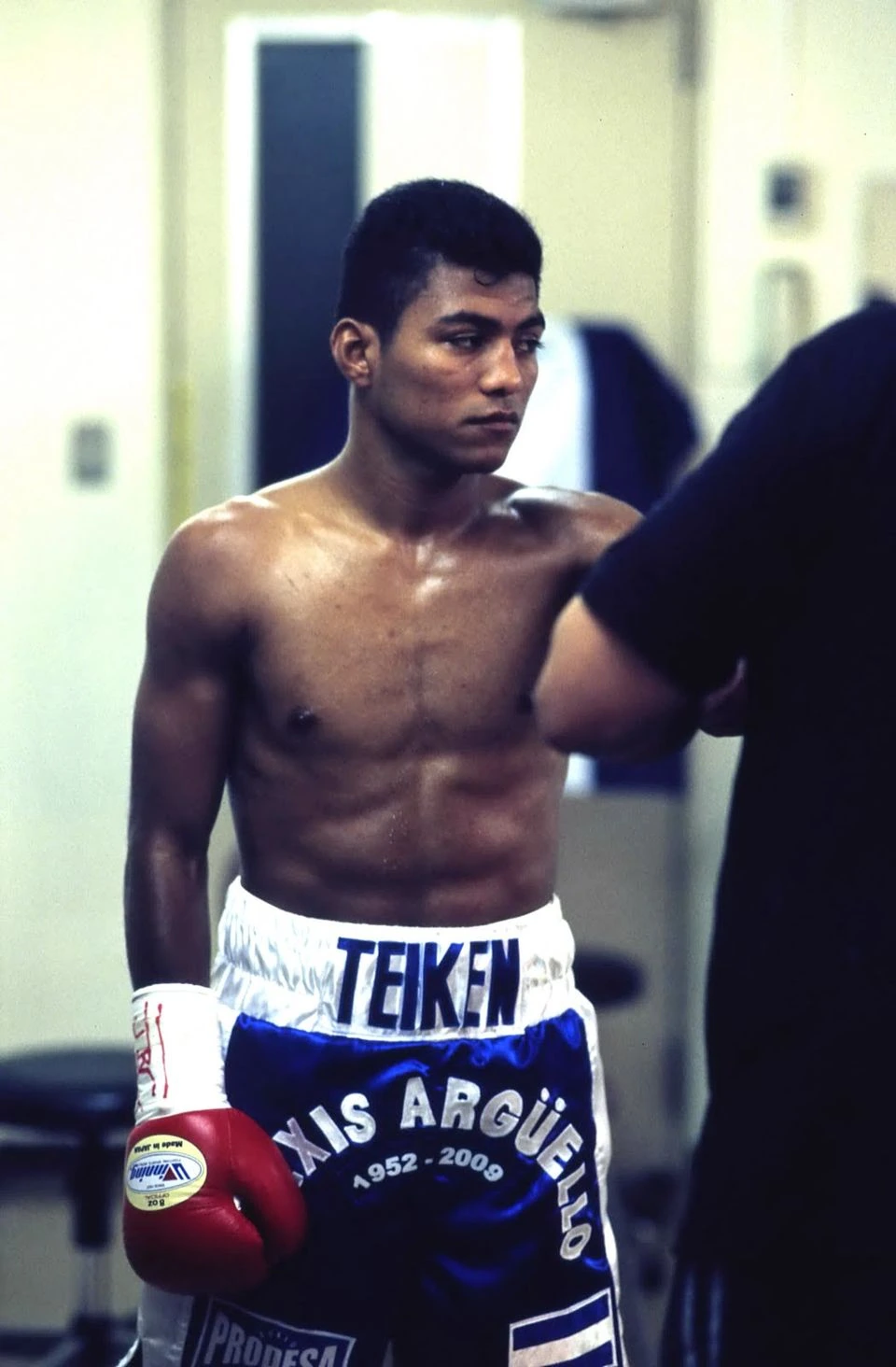 Ricardo Mayorga, Nicaraguan boxer, standing shirtless in boxing gear